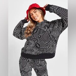 Jordan Brooklyn AOP fleece pullover hoodie black Allover Print | woman’s Large